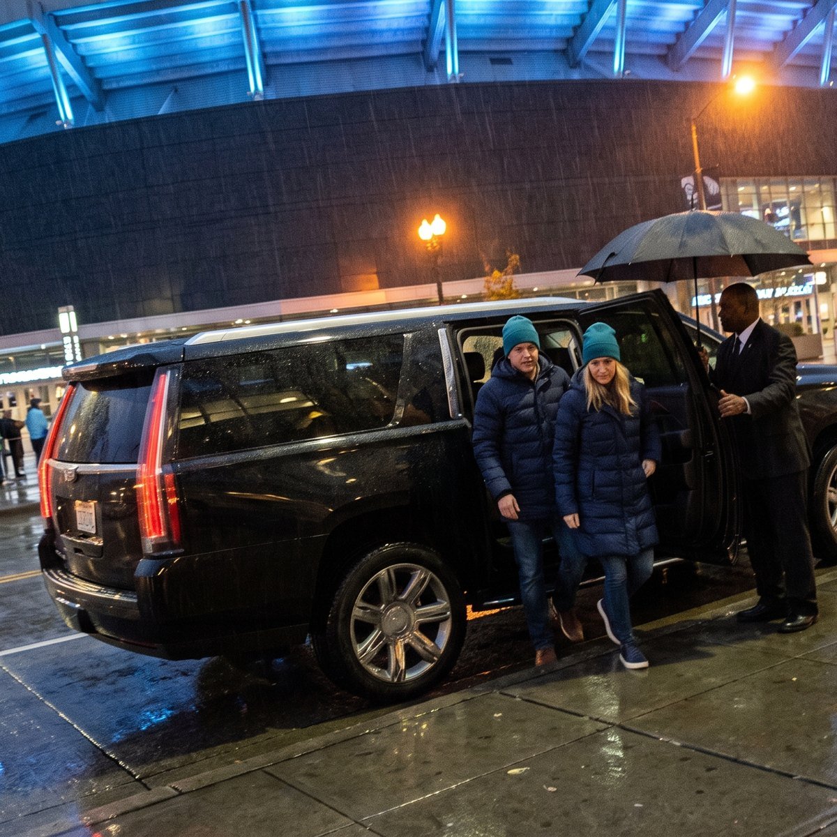 Kamo Limo black SUV dropping off guests at Climate Pledge Arena for a Kraken game